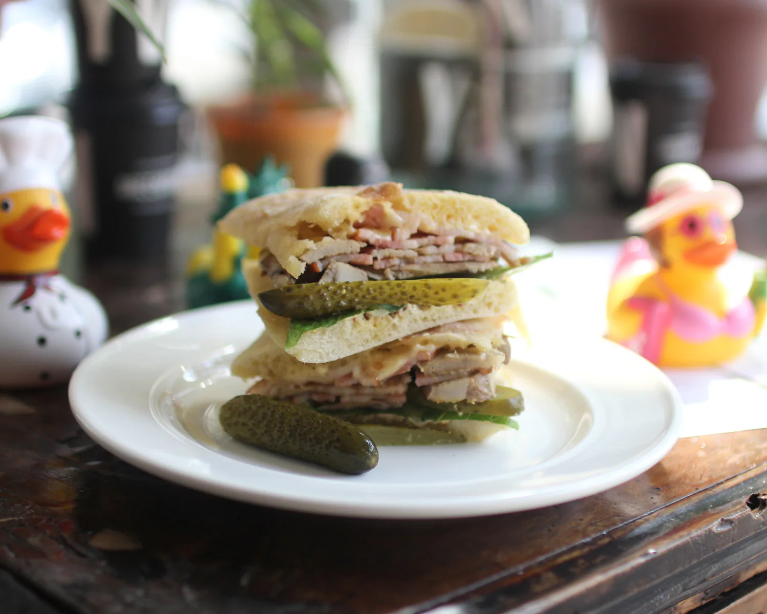 Cubano sandwich with pork, pickles, mayo, and mustard